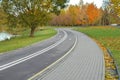 Bicycle road in autumn park Royalty Free Stock Photo