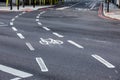 Bicycle road sign painted on the asphalt road Royalty Free Stock Photo