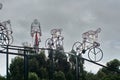 Bicycle sculpture in silhouette on the side of the road