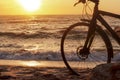 Bicycle on the seashore, sunset on the sea and Bicycle