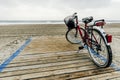 Bicycle on the seaside spit of the La Manga del Mar Menor under the cloudy sky in Murcia city,Spain Royalty Free Stock Photo