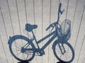 Bicycle shadow on Wooden floor Art abstract background Royalty Free Stock Photo