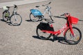 Bicycle sharing bikes for rent from DEEZER, LIDL and JUMP by UBER on street in Berlin