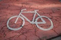 Bicycle sign on asphalt . Royalty Free Stock Photo