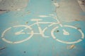 Bicycle sign on the cracked road Royalty Free Stock Photo