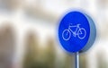 Bicycle sign informative that allows only bikes. Blurred backdrop, space for text, banner, close up. Royalty Free Stock Photo