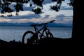 Bicycle silhouette late evening shot overlooking the Pacific Ocean on Vancouver Island British Columbia Canada