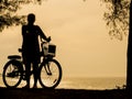 Bicycle silhouette on a sunset. Summer landscape Royalty Free Stock Photo