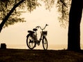 Bicycle silhouette on a sunset. Summer landscape Royalty Free Stock Photo