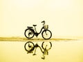 Bicycle silhouette on a sunset. Summer landscape Royalty Free Stock Photo