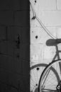 Bicycle in silhouette on wall