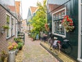 Bicycle in small street Kerkepad in Volendam, Noord-Holland, Netherlands Royalty Free Stock Photo