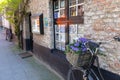 Bicycle stands near the wall of an old house in the old city of Europe