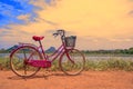 The bicycle stands on a village road at Thalkote lake near Sigiriya