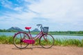 The bicycle stands on a village road at Thalkote lake near Sigiriya