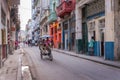 Bicycle taxi in a street of old Havana