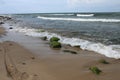 bicycle tire tracks and stones on the beach, Poland Royalty Free Stock Photo