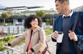 Bicycle, travel and happy business people walking in urban city, communication and team conversation. Worker friends or Royalty Free Stock Photo