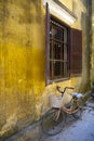 Bicycle under window, Hoi An, Vietnam Royalty Free Stock Photo