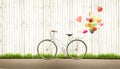 Bicycle vintage with heart balloon