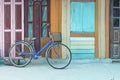 Bicycle on vintage wooden house