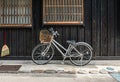 Bicycle on vintage wooden house wall Royalty Free Stock Photo