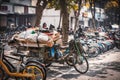 Bicycle with waste on the sidewalk, Hangzhou, China