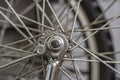 Bicycle wheel on the background of wheel spokes Royalty Free Stock Photo