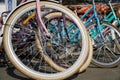 Bicycle wheel in a row close-up wheel detail, bicycle spoke. Royalty Free Stock Photo