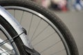 Bicycle wheel in a row close-up wheel detail, bicycle spoke. Royalty Free Stock Photo