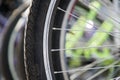 Bicycle wheel in a row close-up wheel detail, bicycle spoke. Royalty Free Stock Photo