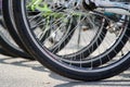 Bicycle wheel in a row close-up wheel detail, bicycle spoke. Royalty Free Stock Photo