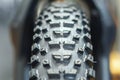 Bicycle wheel, tread on bicycle tire close-up Royalty Free Stock Photo