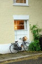 Bicycle with wicker basket parked in front of a house, London, UK Royalty Free Stock Photo