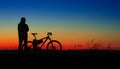 Bicycler silhouette on sunset