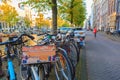 Bicycles with Amsterdams cityscape at sunset Royalty Free Stock Photo