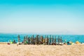 Bicycles on the beach. Summer time bicycle riders resting on a warm sand beside the sea