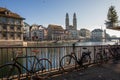 Bicycles and beautiful view of historic city center of Zurich with famous Grossmunster Church, Helmhaus and Munsterbucke Royalty Free Stock Photo