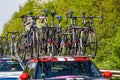 Bicycles on a car following cyclists during the second stage of Giro d'Italia 2016