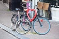 Bicycles chained up to a heart in Amsterdam