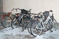 Bicycles covered with snow