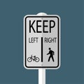 symbol Bicycles Keep Left Pedestrians Keep Right Sign isolated on grey sky background.Vector illustration