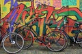 Bicycles leaned against wall