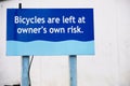Bicycles left at owners own risk sign