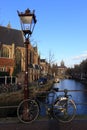 Bicycles lining a bridge over the canals of Amsterdam, Netherlands Royalty Free Stock Photo