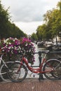 Bicycles lining a bridge over the canals of Amsterdam, Netherlands Royalty Free Stock Photo