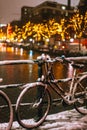 Bicycles Parked Along a Bridge Over the Canals of Amsterdam Royalty Free Stock Photo
