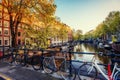 Bicycles Parked Along a Bridge Over the Canals of Amsterdam, Net Royalty Free Stock Photo
