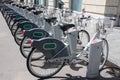 Bicycles parked at a bike sharing station Royalty Free Stock Photo