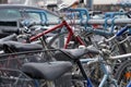 Bicycles parked on a busy street with cars